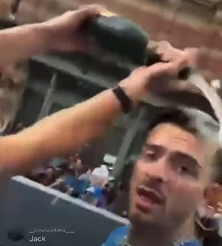 Haaland pours champagne over Grealish's head during Manchester City's treble celebrations