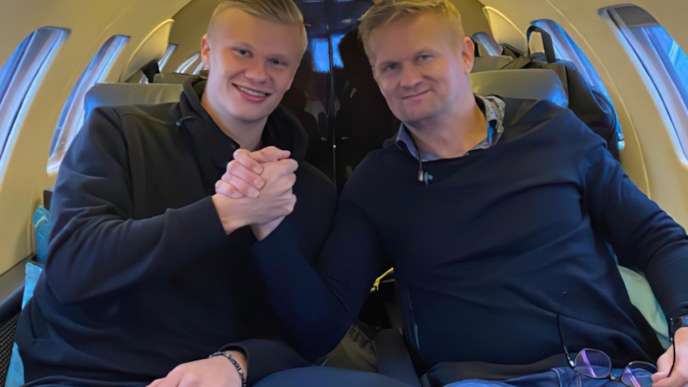 Erling Haaland with his father Alf-Inge Håland, highlighting the footballing legacy between two generations